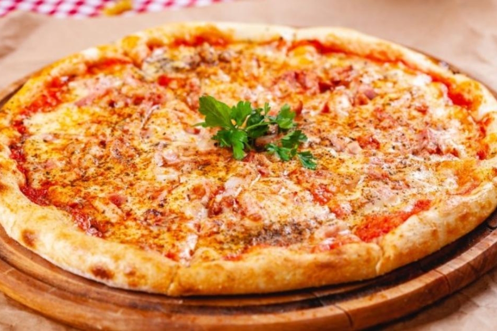 Massa de pizza perfeita para fazer na sua noite da pizza com a família